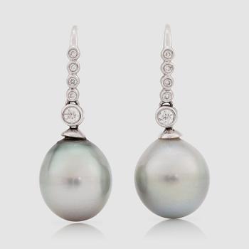1341. A pait of light gray cultured Tahitian pearls and brilliant-cut diamonds total carat weight circa 0.43 ct.