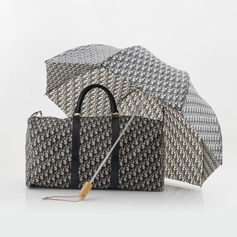 Christian Dior, a canvas weekend bag and umbrella.