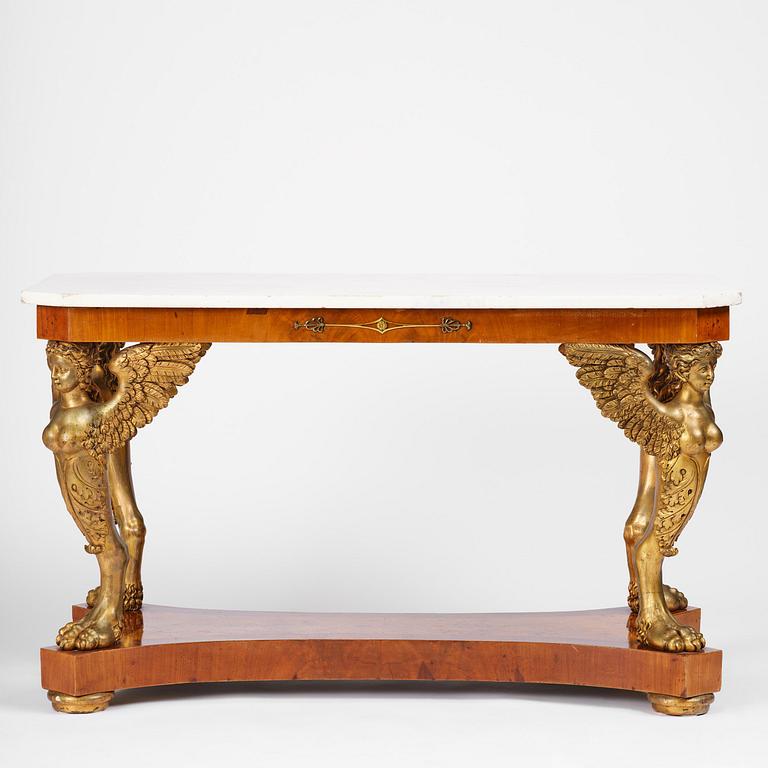 A presumably Austrian Empire centre table, early 19th century.