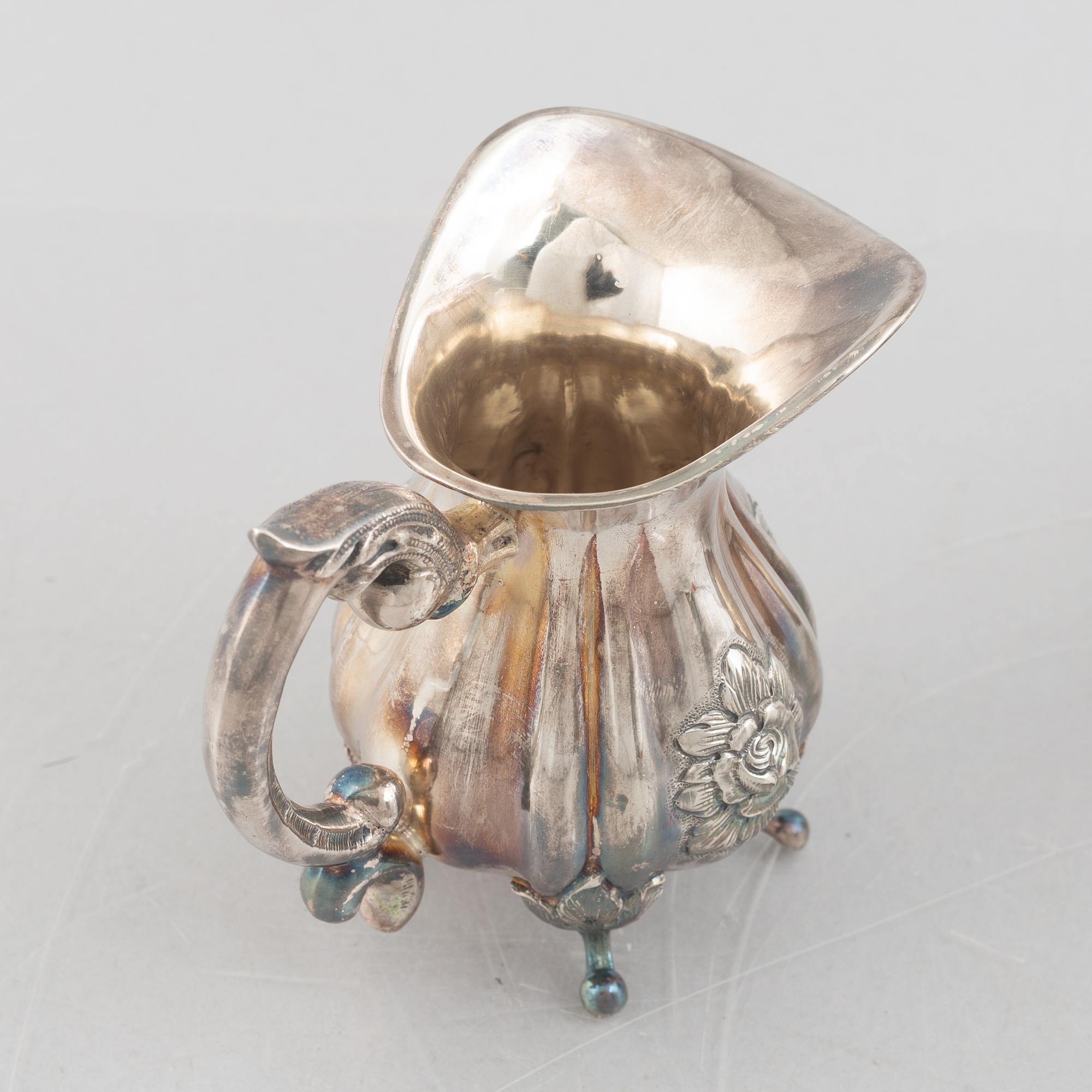 An Austrian silver coffee pot, tea pot, cream jug and sugar bowl, Vienna 1826.
