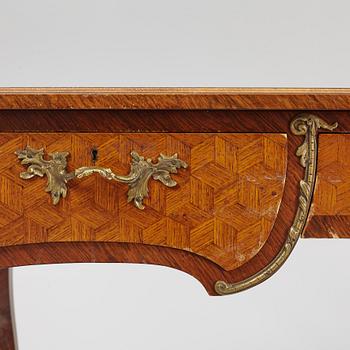 A Louis XV-style bureau plat desk, early 20th century.