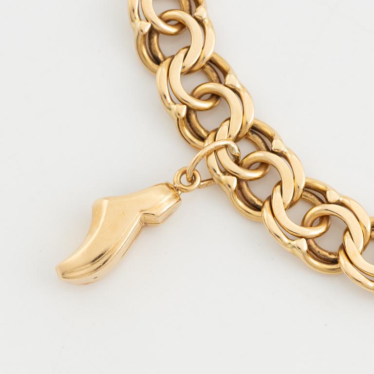 Bracelet 18K gold, bismarck, with two pendants 14K gold.