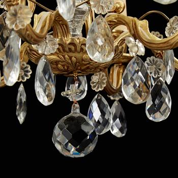 A Rococo style chandelier, mid 20th Century.