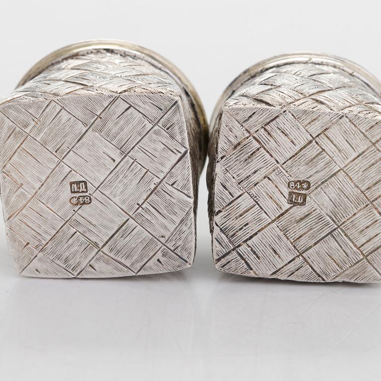 A silver and glass bottle with eight silver charka, maker marks of Pyotr Yermolajevich Davidov, Saint Petersburg, 1884.