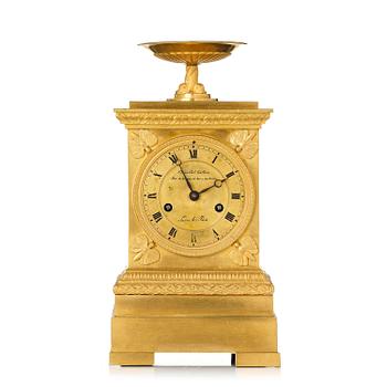 177. A French Empire ormolu mantel clock by Louis-Isidore Choiselat (master in Paris 1813-47).