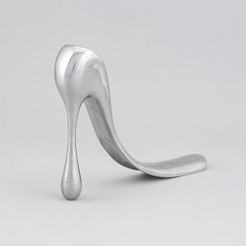 A metal shoe horn by Manolo Blahnik, 2000s.