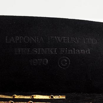 Björn Weckström, Kaulakoru "Kukkiva muuri", 18K kultaa ja turmaliineja. Lapponia 1974.