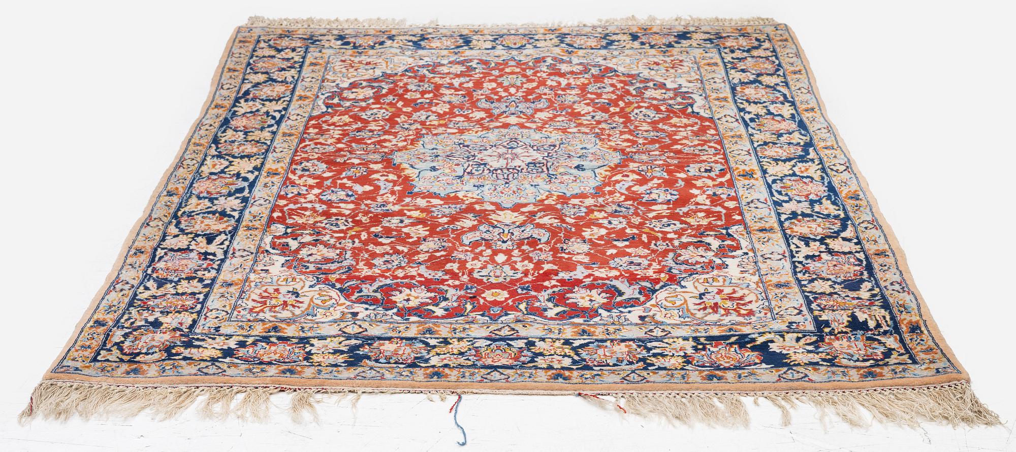 A semi-antique Isfahan rug, Central Persia, c. 160 x 105 cm.
