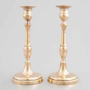 Skultuna Messinsbruk, two pairs of brass candlesticks, 19th century.