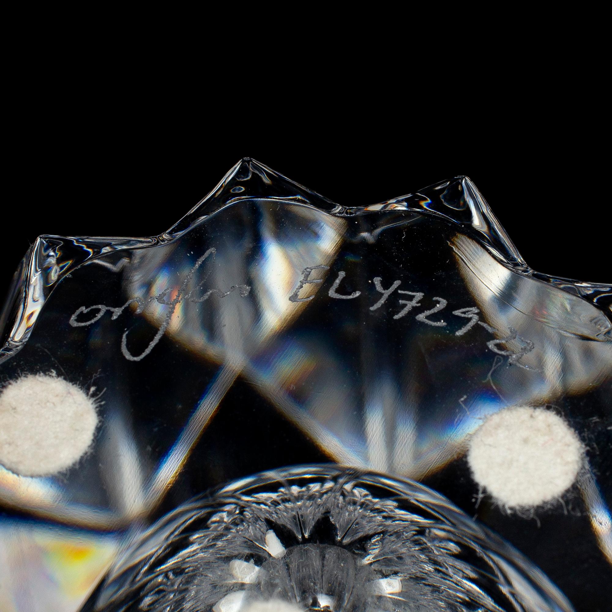 ERIKA LAGERBIELKE, a glass 'Zodiak' vase and two bowls from Orrefors.