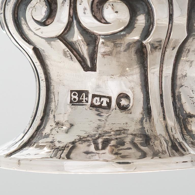 A pair of silver candelabra, maker marks of Carl Johan Tegelsten, Saint Petersburg 1850.
