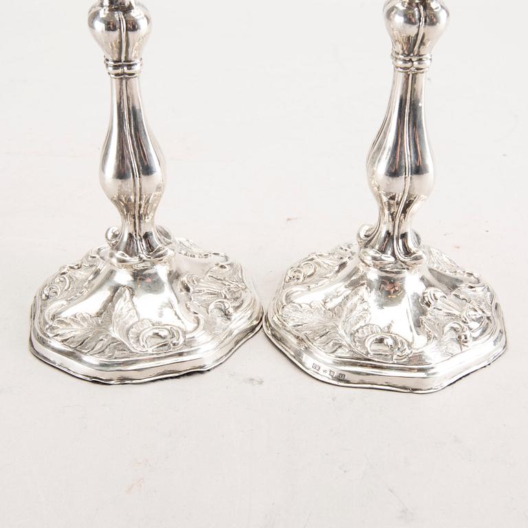 A 19th century pair of silver candle sticks mark of Oskar Närman Mariestad 1877.