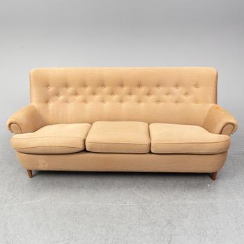 A 'Hemmakväll' sofa by Carl Malmsten.