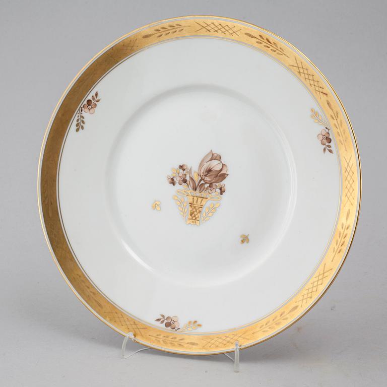 78 pieces of porcelain ware, model "Golden Baskett" by Royal Copenhagen, second half of the 20th cenutry.