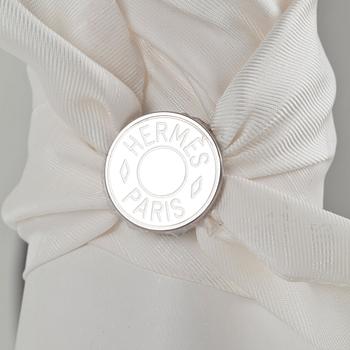 HERMÈS, three silk braclets with palladiumcovered locks.
