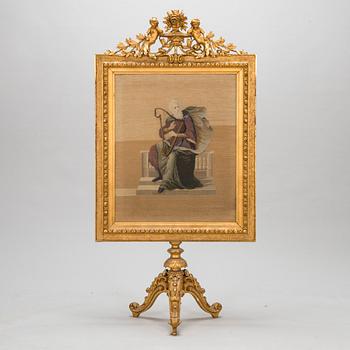 A late 19th century fire screen.