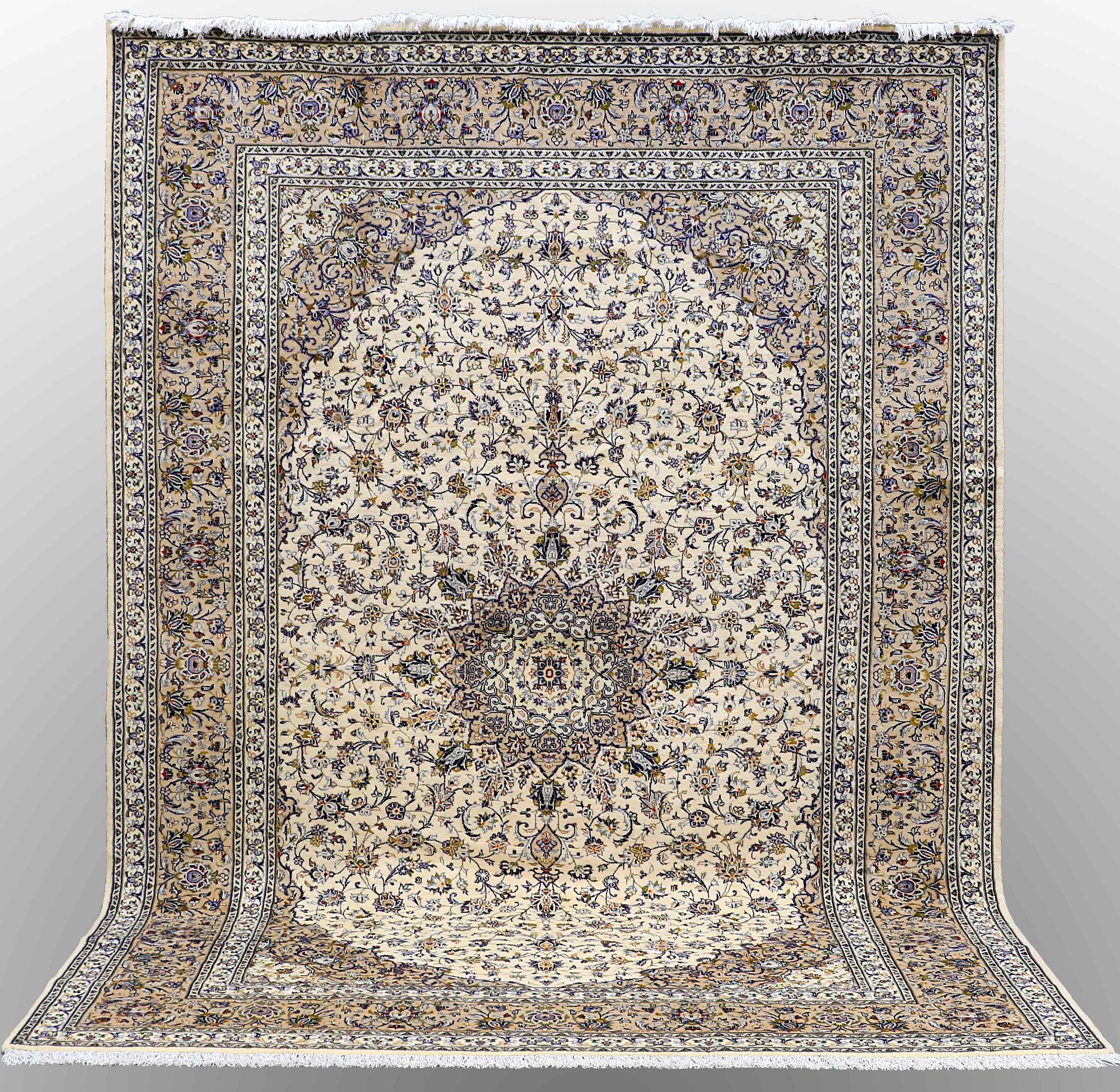 A Keshan carpet, approx. 354 x 254 cm.