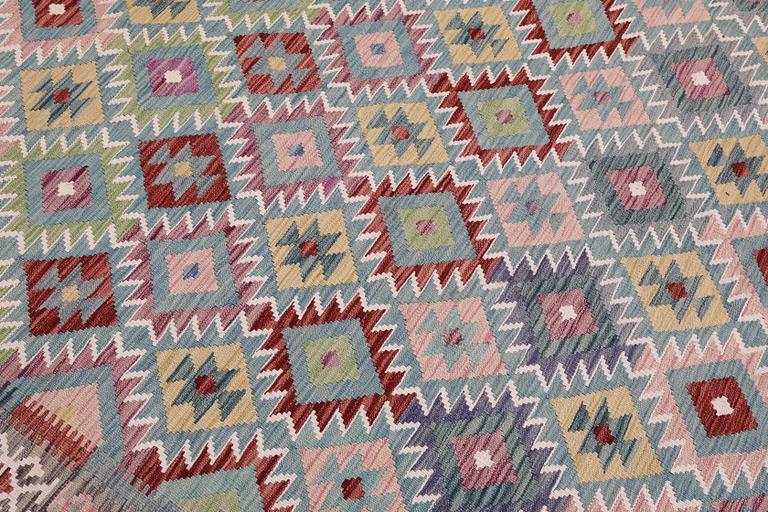 A Killim rug, approx. 295 x 204 cm.