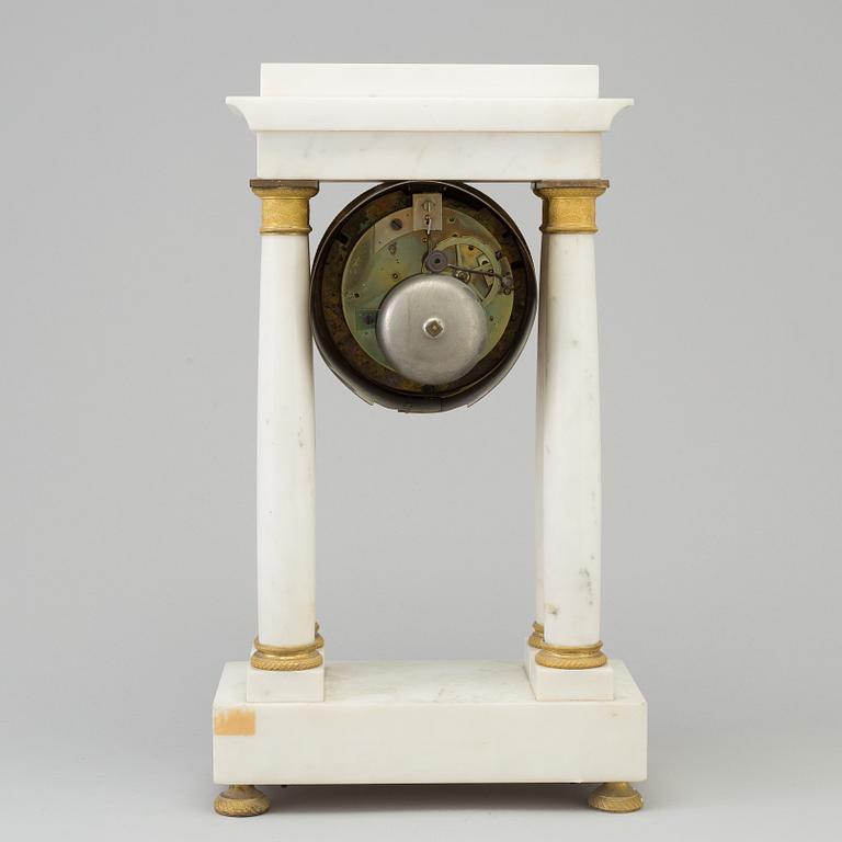 A french empire mantle clock, first half of the 19th century.