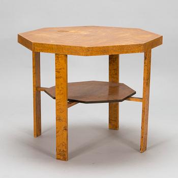 A 1920s Carelian birch veneered table.