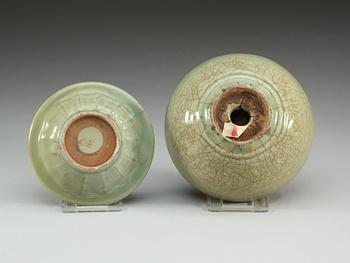 A celadon glazed double fish dish, and a hot water dish, Yuan dynasty (1271-1368).
