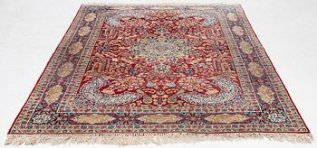 A semi-antique Kirman carpet, c. 275 x 180 cm.