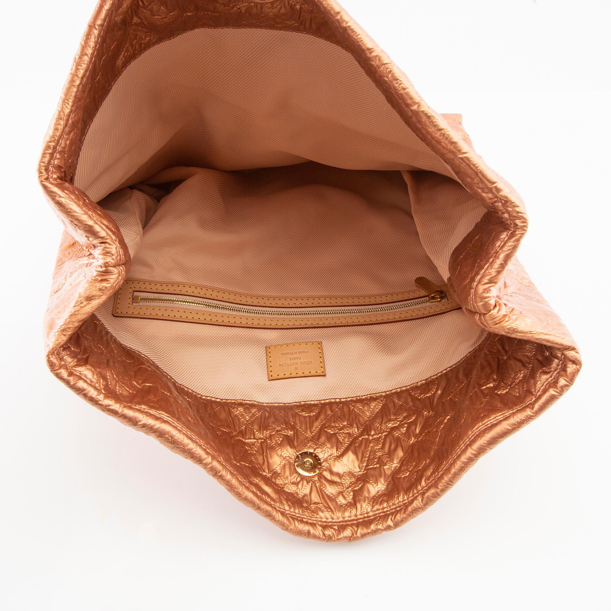 Louis Vuitton,.