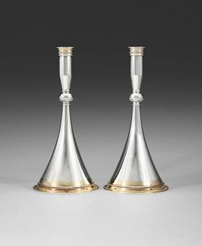 408. A pair Wiwen Nilsson sterling, partly gilt, candelsticks, Lund 1957.