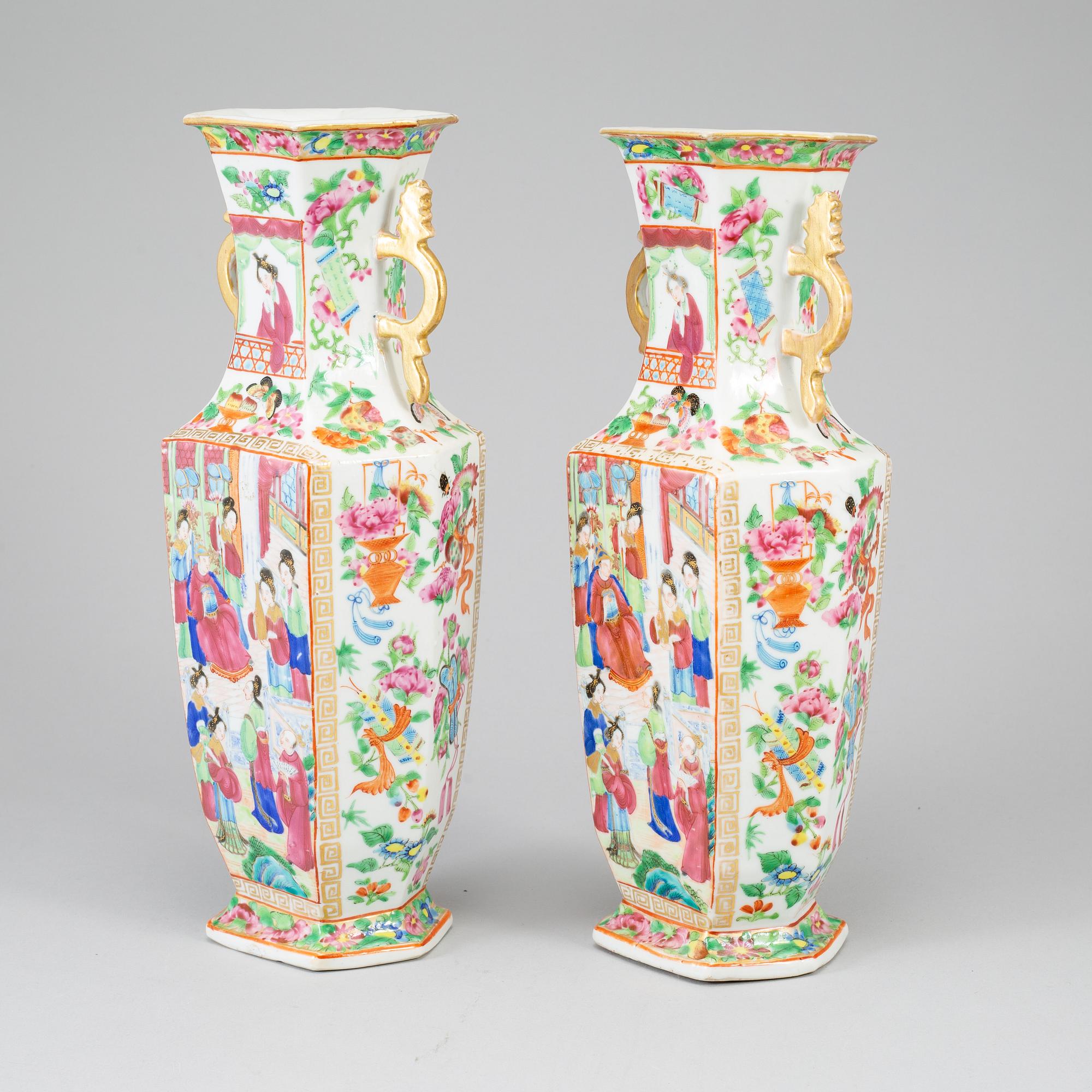 A pair of famille rose canton vases, Qing dynasty, 19th century.