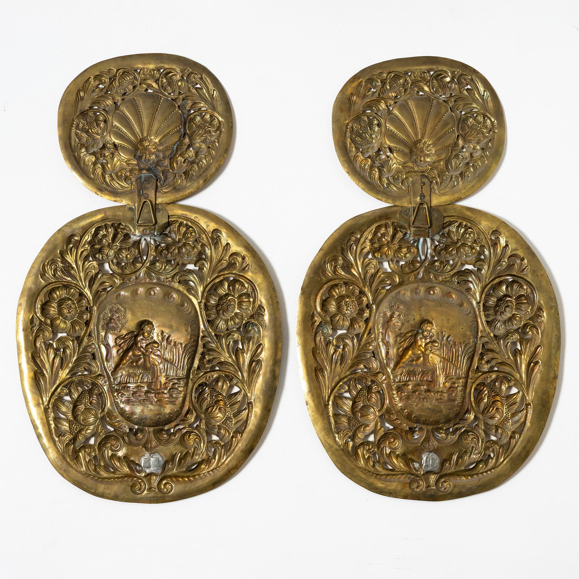 A pair of  Swedish Baroque style brass light plates, Johan F Hellström, Nyköping around the year 1900.