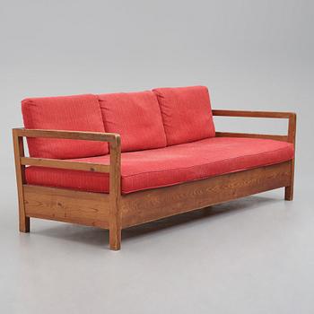 Axel Einar Hjorth, a stained pine sofa 'Sport', Nordiska Kompaniet Sweden, late 1930s.