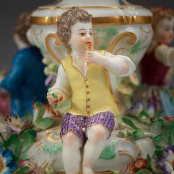 A flower-encrusted Meissen seven-light candelabra, end of 19th Century.