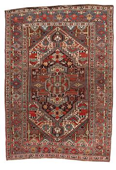 353. An antique Qashqai rug, southeastern Iran, c. 242 x 170 cm.