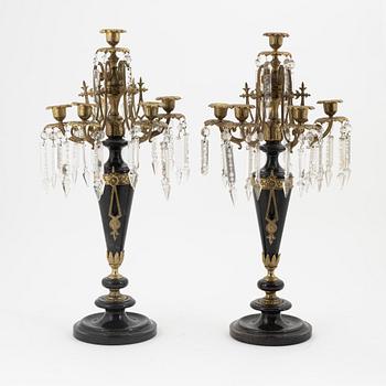 A pair of stone and gilt brass six-light candelabra, circa 1900.