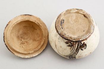 A Cizhou ware pot with cover, presumably Yuan dynasty (1260-1370).