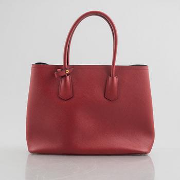 Prada, A red Saffiano Tote Bag.