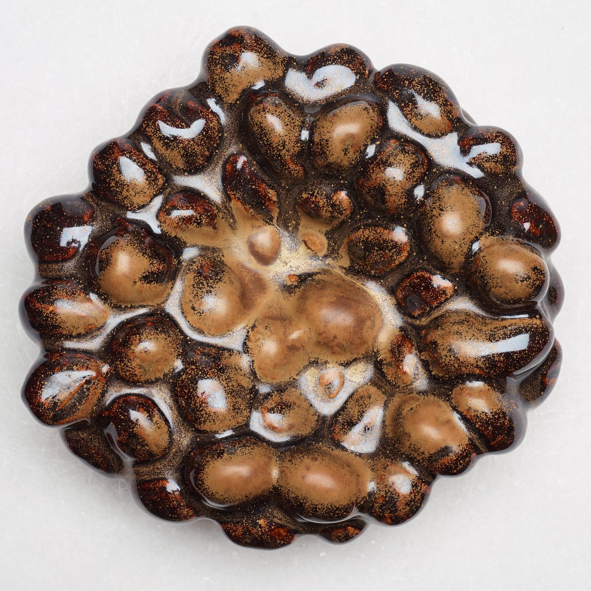 Mårten Medbo, a stoneware dish, Sweden, signed and dated 2001.