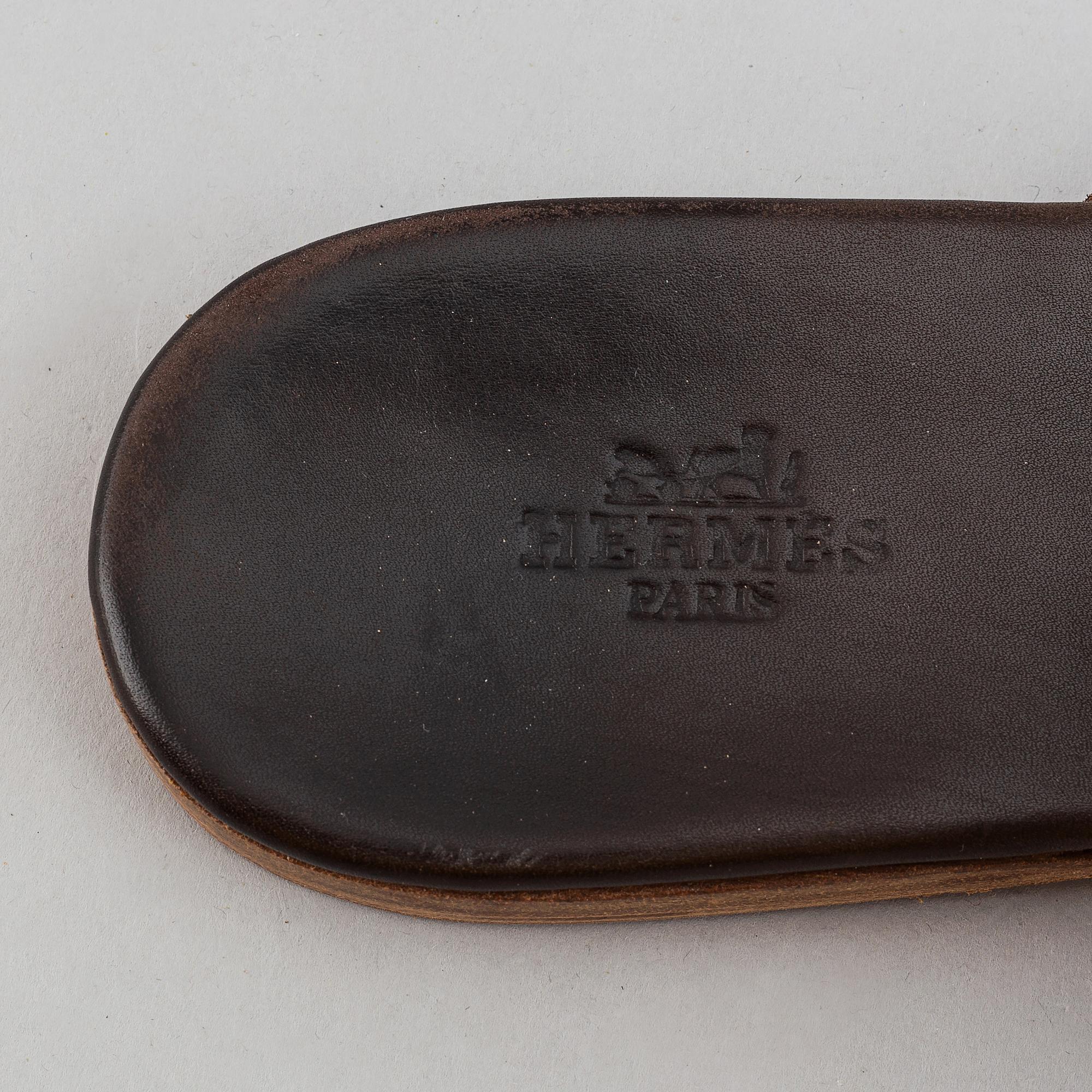 Hermès, a pair of leather sandals, size 39.