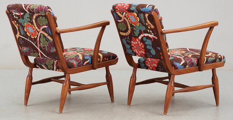 A pair of Josef Frank mahogany armchairs, Svenskt Tenn, model 638.