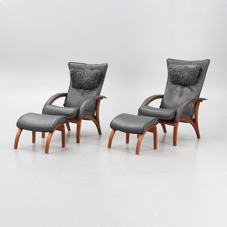 A pair of armchairs with foot stools, model 'Delta Legend' and 'Delta Legend Large', Brunstad Norway.