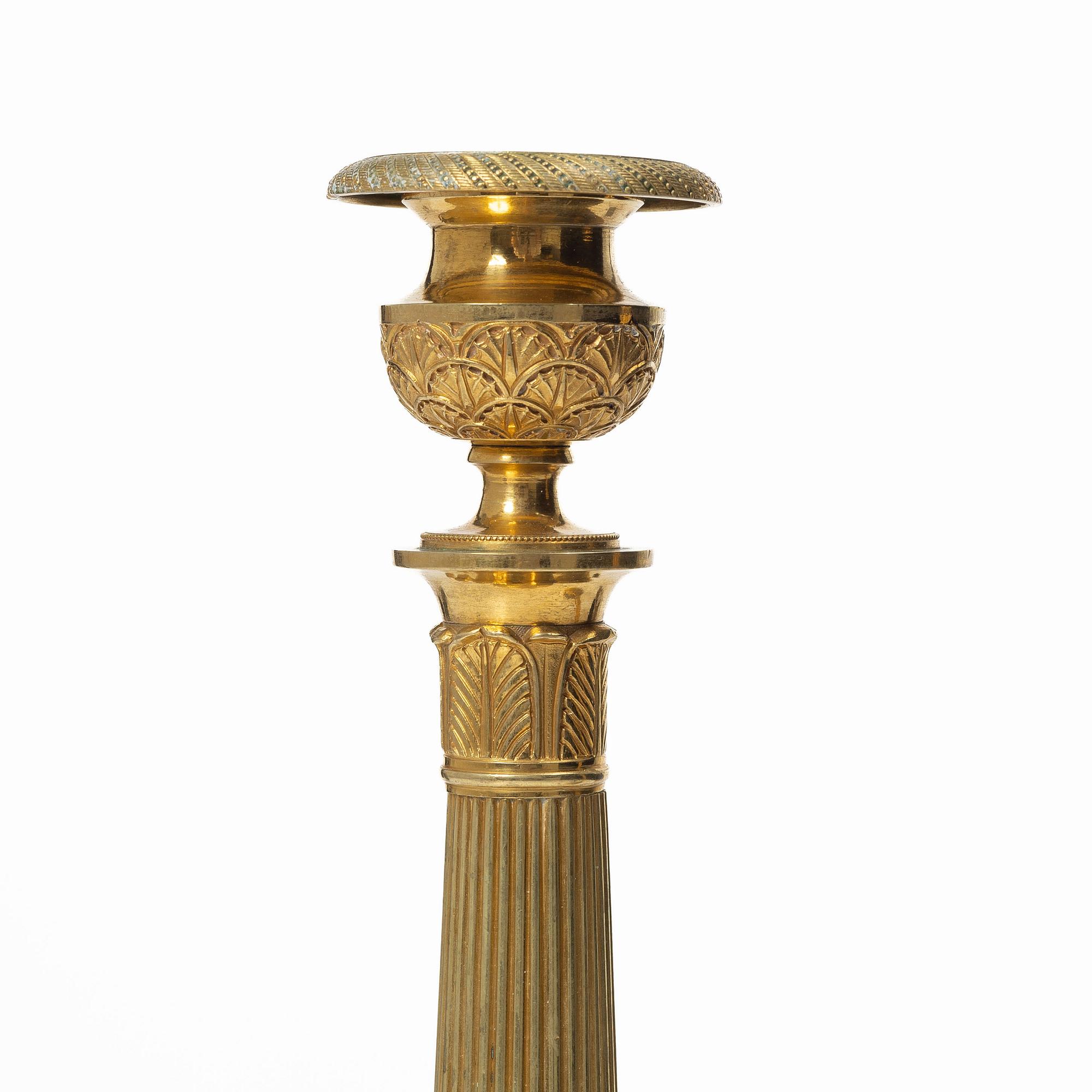 Candlesticks, a pair, Empire style, 20th century.