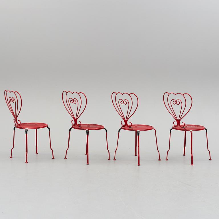 GARDEN FURNITURE, a table and four chairs, late 20th century.