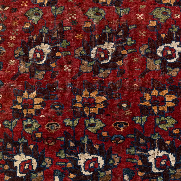 An oriental rug, semi antique, probably Baluch, c. 210 x 170 cm.