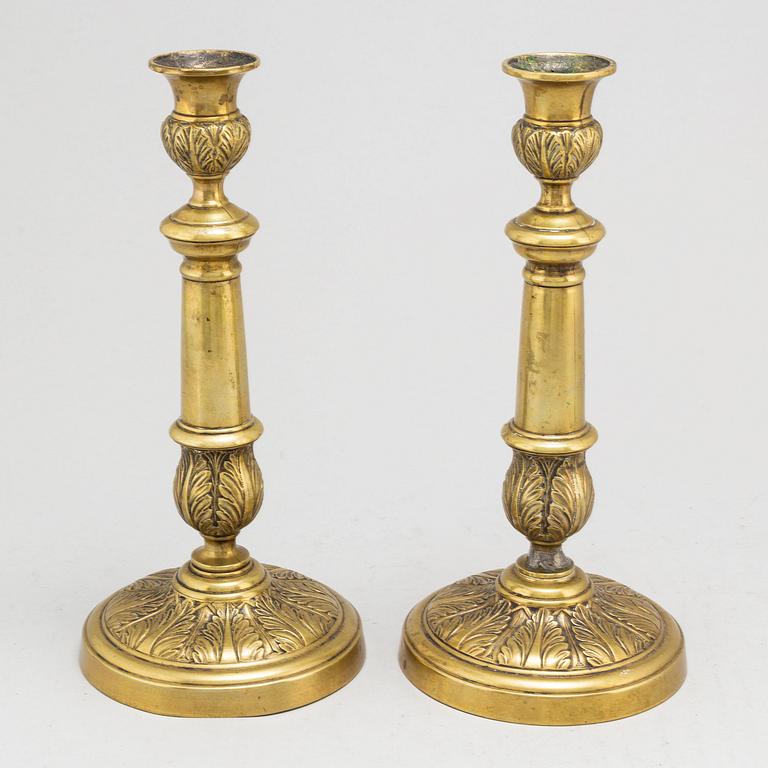 A pair of Empire bronze candlesticks, first half of the 19th century.