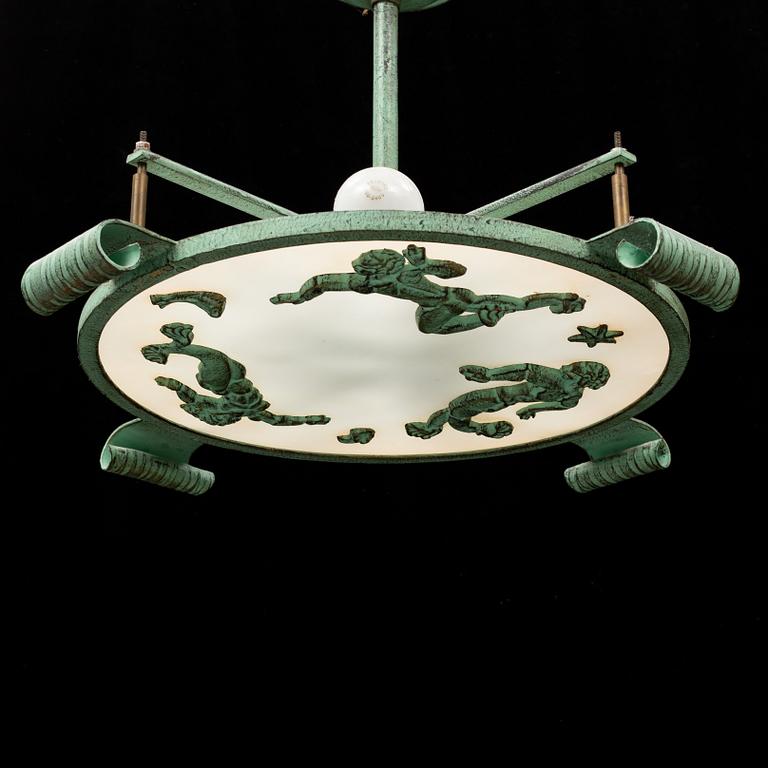 A 1930s art déco ceiling light.