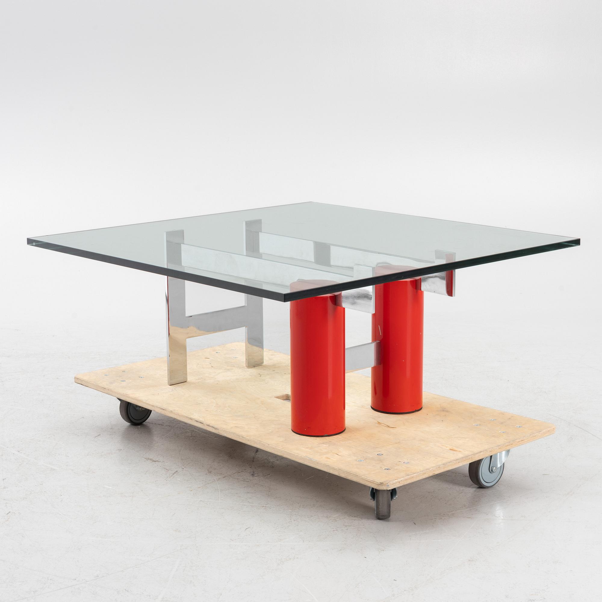 A coffee table with glass top, late 20th Century.