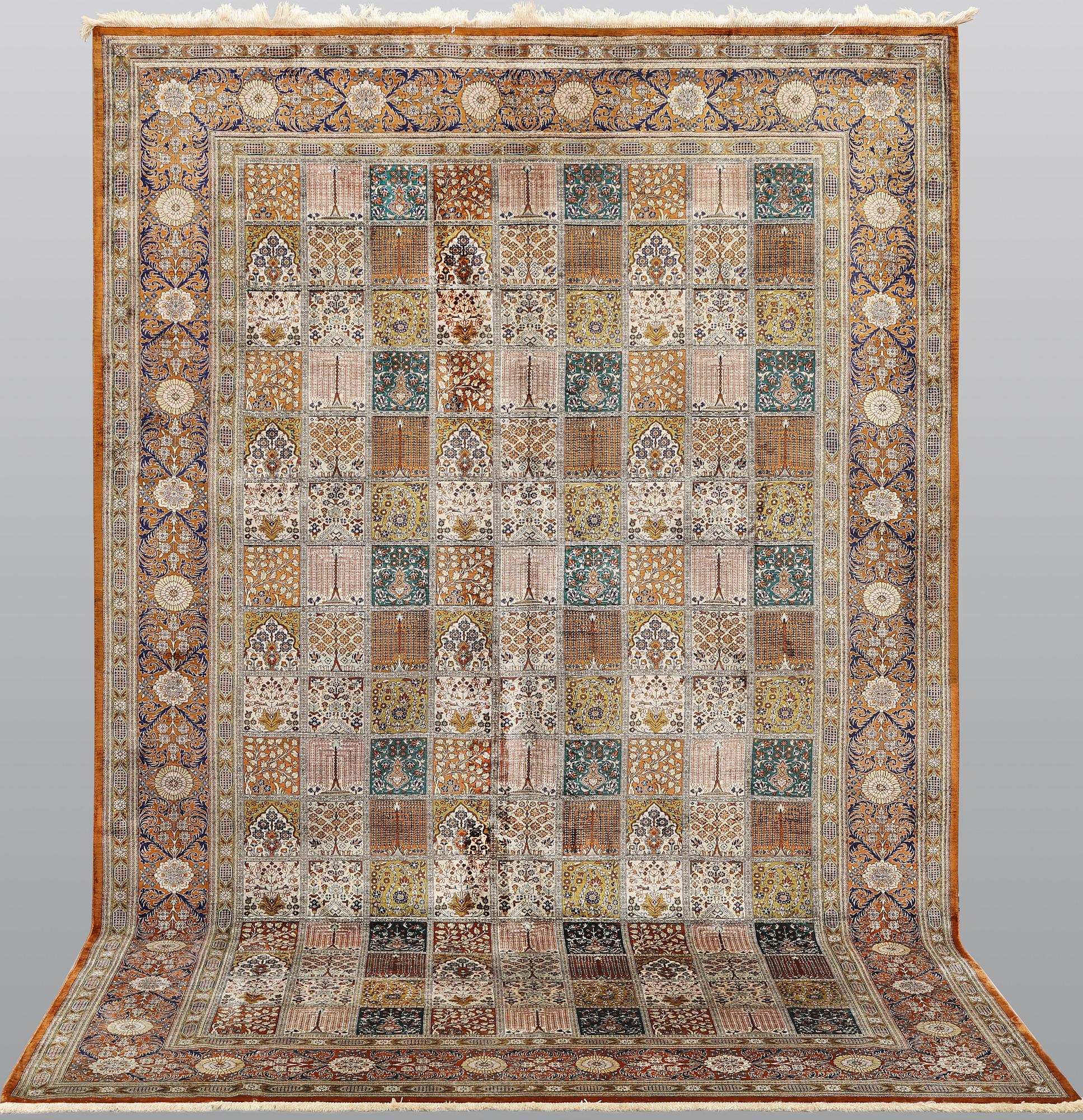 A silk Ghom carpet, 296 x 194 cm.
