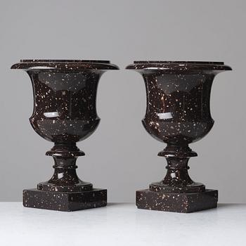 A pair if Swedish porphyry urns, early 19th century.