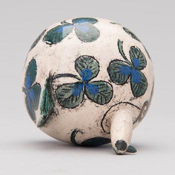 A ceramic bird signed Kaipiainen.