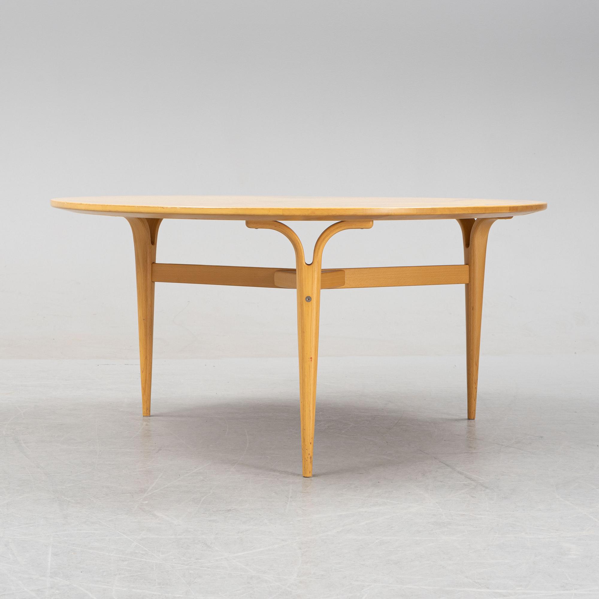 Bruno Mathsson & Piet Hein, a 'Tri Super Elliptical' coffee table, manufactered by Fritz Hansen, Denmark.